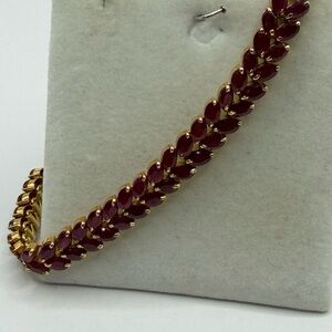 Elegant 2-Row Ruby Bracelet set in 14K yellow gold